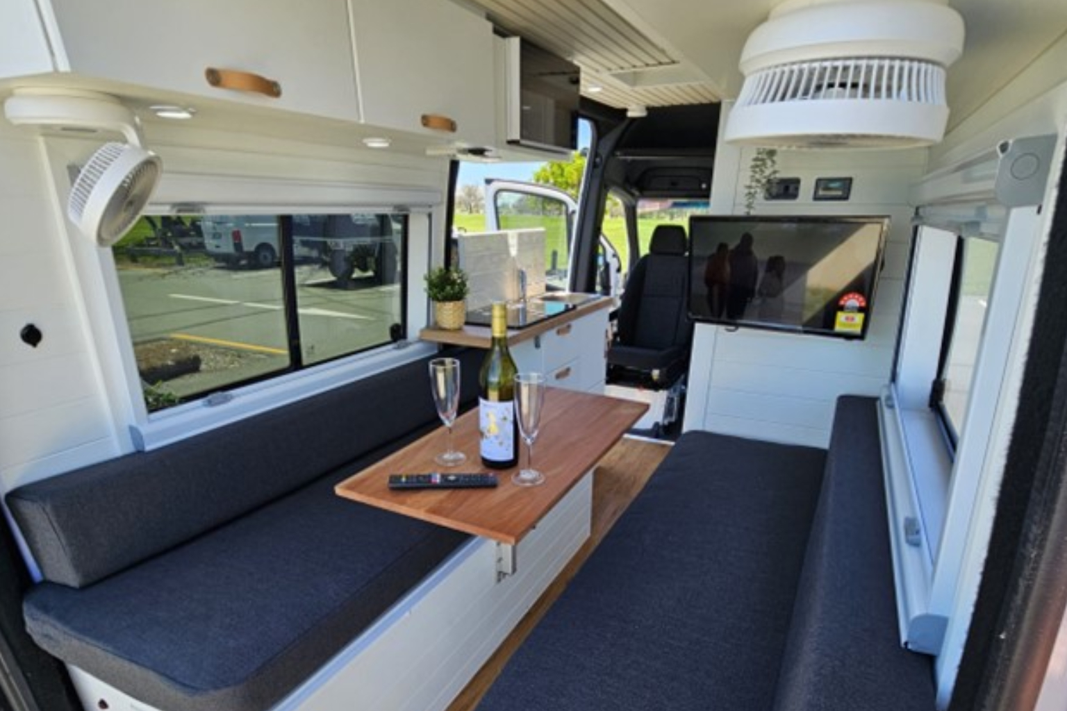 Custom camper conversion with luxury interior by Vanish Campers